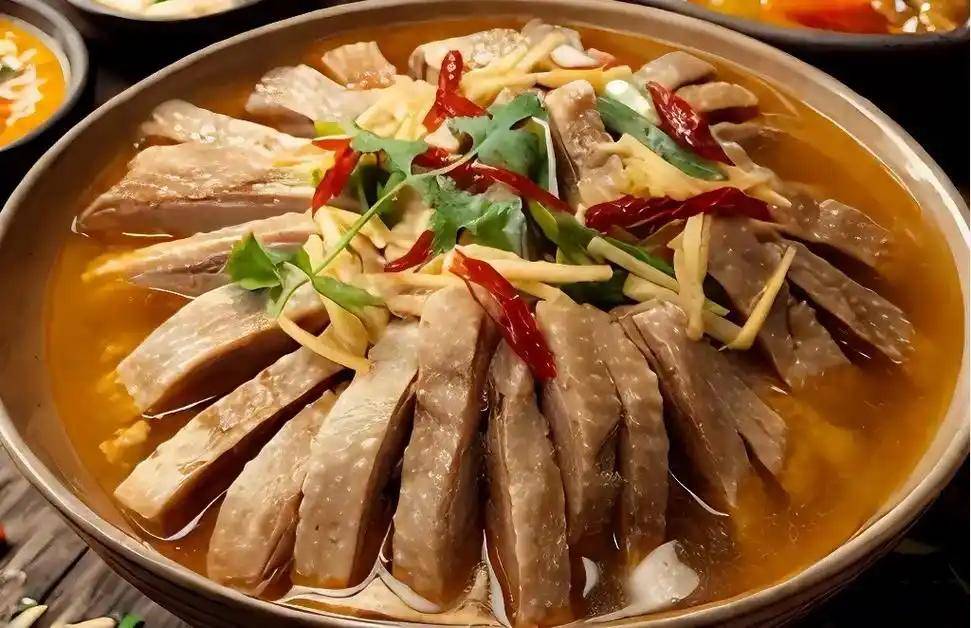 吕文扬：把一锅固始鹅块熬成浸满乡土的老风味