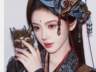 鞠婧祎古风写真再出新 战国袍配传统发饰冷艳吸睛
