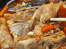 红椒铺就盘中色,百年湘味尽在剁椒鱼头间